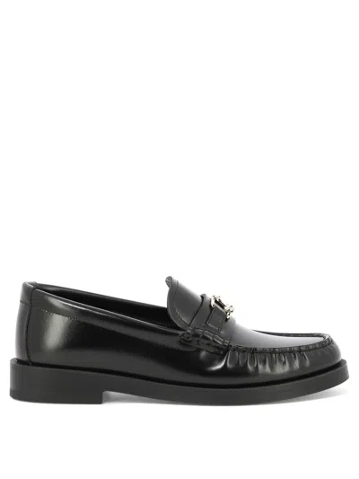 JIMMY CHOO WOMEN'S BLACK LEATHER LOAFERS WITH JC EMBLEM AND MONOCHROME HARDWARE