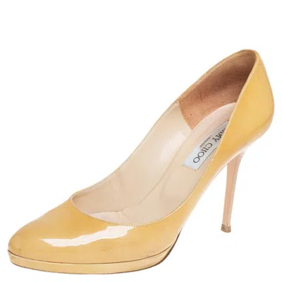 Jimmy Choo Yellow Patent Leather Cosmic Platform Pumps