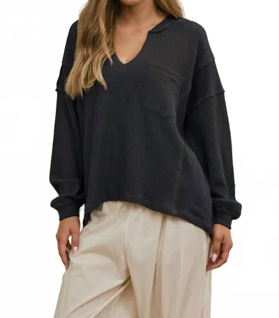 Joa Split Neck Raw Edge Ribbed Knit Top In Charcoal In Black