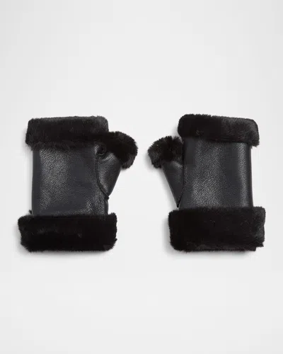 Jocelyn Gstaad Faux Fur And Leather Fingerless Mittens In Black