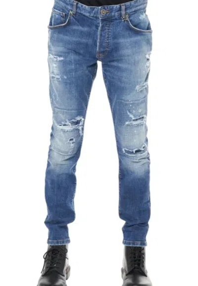 John Richmond Slim Fit Jeans With Tears In Denim Medio