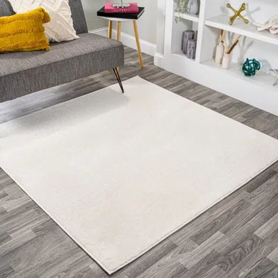 Jonathan Y Haze Solid Low-pile Area Rug In Beige/ecru