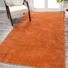 Jonathan Y Haze Solid Low-pile Area Rug In Coral-orange