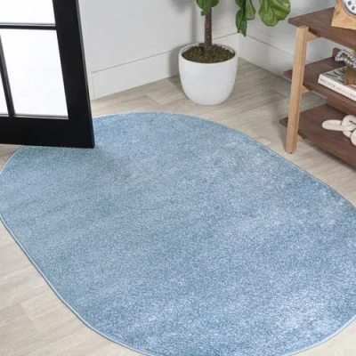 Jonathan Y Haze Solid Low-pile Oval Area Rug In Blue/lagoon