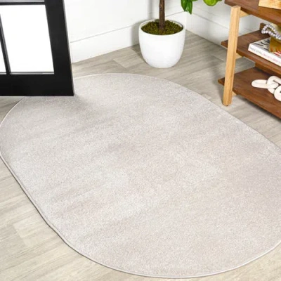Jonathan Y Haze Solid Low-pile Oval Area Rug In Eggshell/ivory