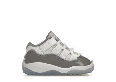 Pre-owned Jordan 11 Retro Low Sneakers In White/cement Grey/university Blue