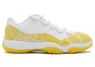 Pre-owned Jordan 11 Retro Low Yellow Snakeskin Sneakers In White/tour Yellow/sail In Multi