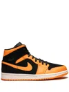 Jordan Air  1 Mid Sneakers In Orange