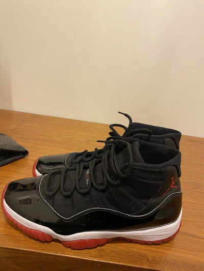 Pre-owned Jordan Brand 11 Bred Shoes In Black