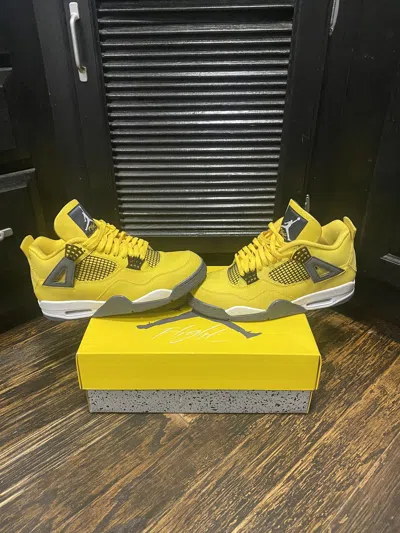 Pre-owned Jordan Brand 4 Retro Lightning 2021 Shoes In Yellow
