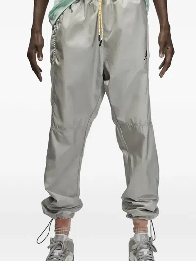 Jordan Drawstring Track Pants In Gray