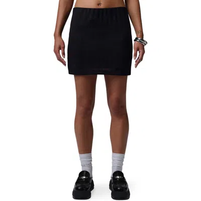 Jordan Flight Open Stitch Knit Skort In Black