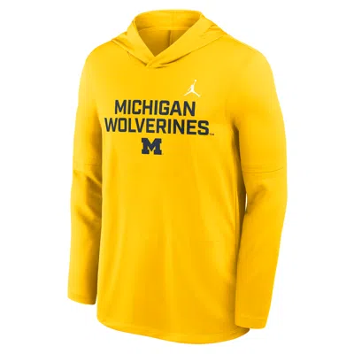 Jordan Men's Michigan Sideline  Brand Dri-fit College Long-sleeve Hooded Top In Yellow