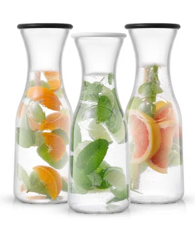 Joyjolt Hali Set Of 3 Glass Carafes With 6 Colored Lids, 35 oz In Clear