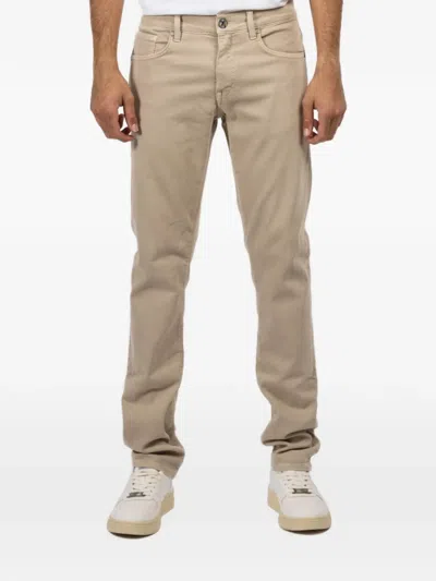 Jude Axe Button Jeans In Brown