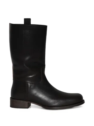 Jude Leif Leather Boots In Black
