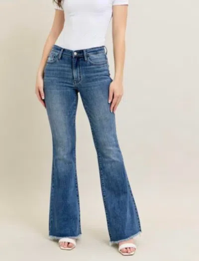 Judy Blue Mid Rise Vintage Wash Flare Jeans With Distressed And Fray Hem In Md In Blue