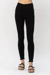 JUDY BLUE TUMMY CONTROL SHARK BITE HEM SKINNY JEAN IN BLACK