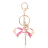Juicy Couture Bow Charm Gold Keychain In Gold