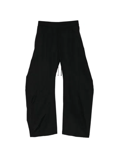 Julius Bending Wide-leg Trousers In Black
