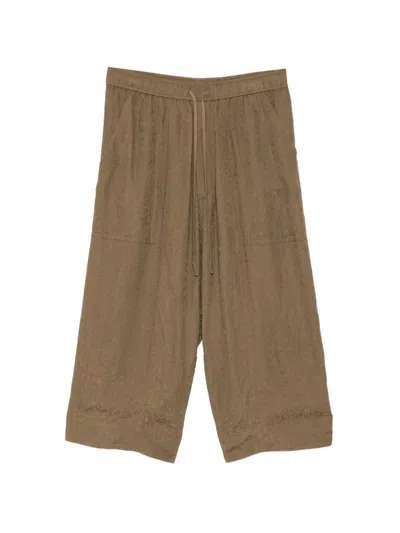 Julius Cropped Wide-leg Trousers In Brown