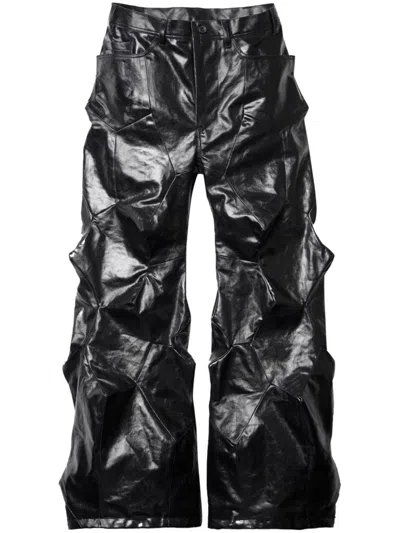 Julius Thorn Flared Jeans In Black