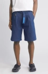 JUNGLES PLEATED BELTED DENIM SHORTS