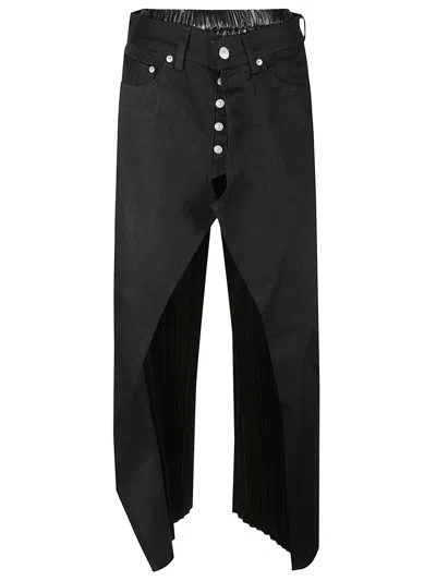 JUNYA WATANABE DENIM AND FAUX LEATHER JEANS