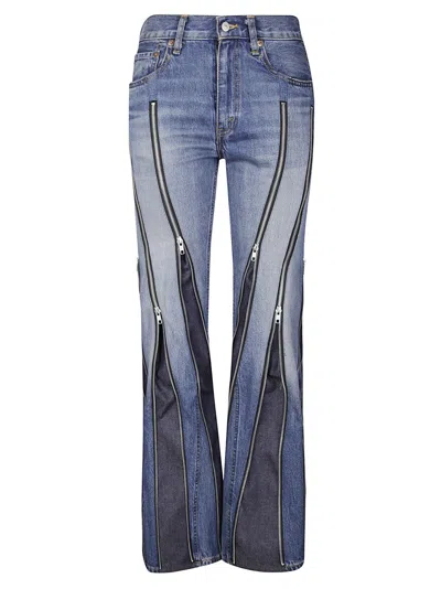 JUNYA WATANABE FLARED DENIM TROUSERS WITH ZIPPER DETAIL