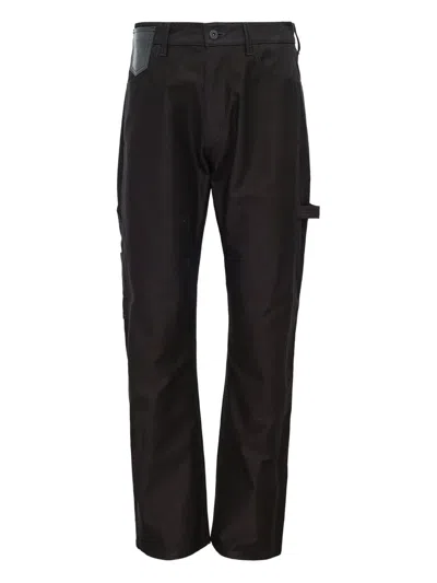 Junya Watanabe Leather-patch Cotton Trousers In Black