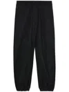 Junya Watanabe Panelled Tapered Trousers In Schwarz