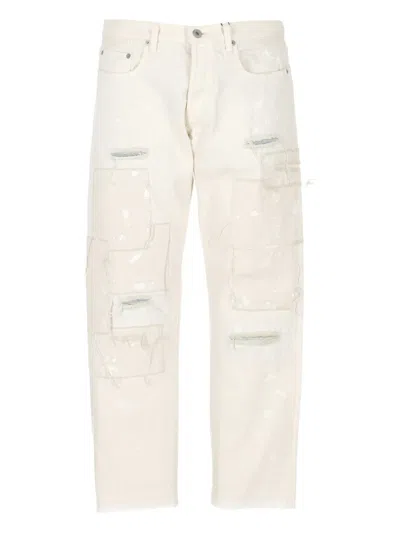 JUNYA WATANABE PATCHWORK FRAYED JEANS