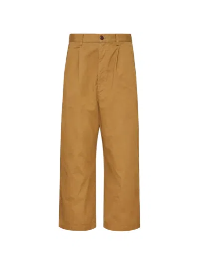 Junya Watanabe Pleated Garment-dyed Trousers In Brown