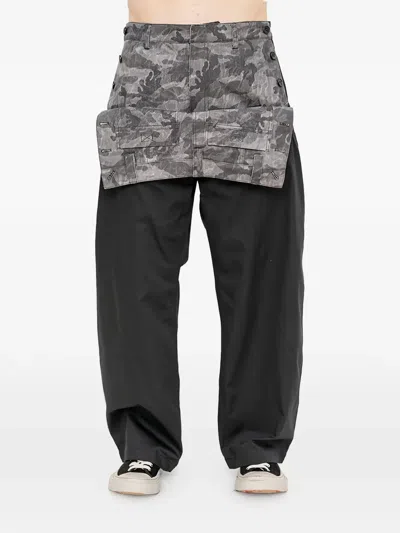 Juunj Camouflage-print Layered-panel Trousers In Black