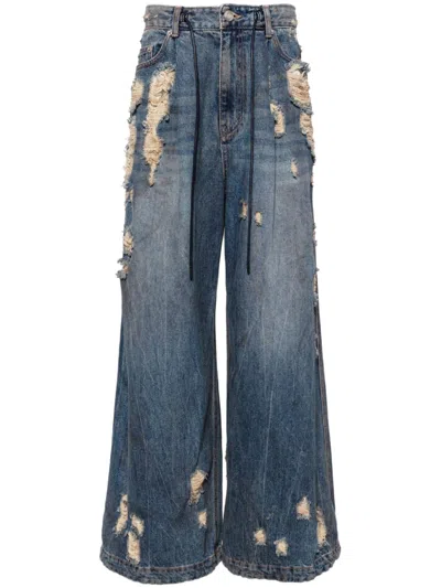 Juunj Oil Washed Distressed Wide Denim Pants In Blu