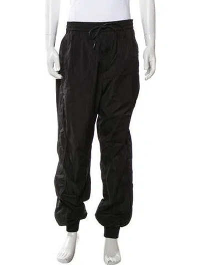 Pre-owned Juunj Joggers In Black