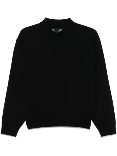 Juunj Logo-embossed Polo Top In Black