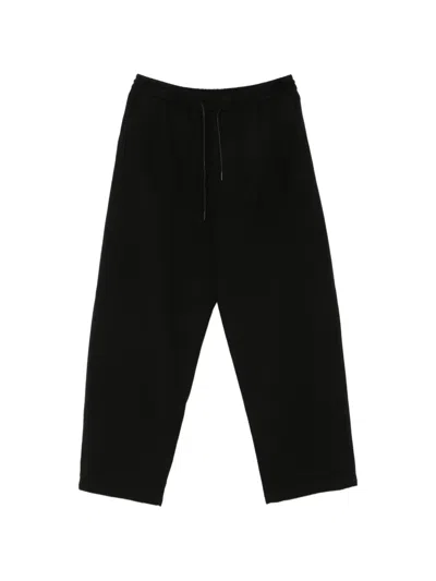 Juunj Logo-embroidered Trousers In Black