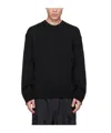 Juunj Rib Knitted Round-neck Sweater In Black