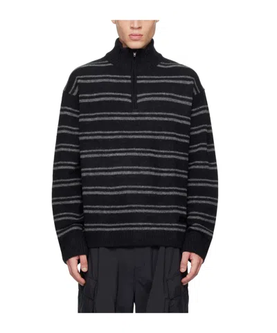 Juunj Striped Turtleneck Sweater In Black