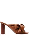 Jw Anderson Bow Heeled Mules In Brown
