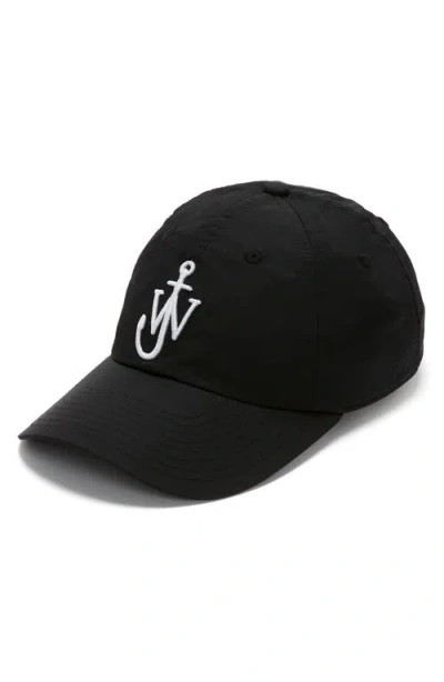 Jw Anderson Curved Peak Logo Embroidered Baseball Cap In Black