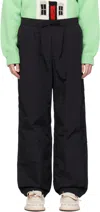 Jw Anderson Black Pants With Elastic Waist With Drawstring In Techn Fabric Man In 999
