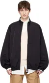 Jw Anderson Black Jacket With Mock Neck And Raglan Sleeves In Tech Fabric Man In 999
