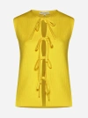 Jw Anderson Tie-detailed Ribbed Cotton-blend Top In Bright Yellow