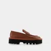 Jw Anderson Bumper Chunky Flats In Orange Leather In Brown