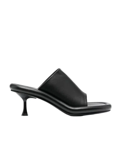 Jw Anderson Bumper-tube Leather Mules In Black