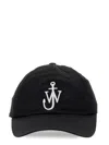 Jw Anderson Curved Peak Logo Embroidered Baseball Cap In Black