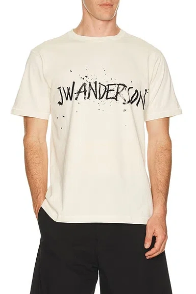 Jw Anderson Circular Logo Graphic Short Sleeve T Shirt In Neutral