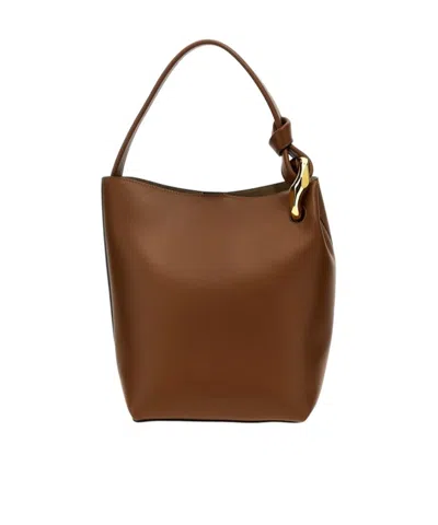 Jw Anderson Corner Bucket Bag In Brown